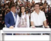  ?? PHOTO BY VIANNEY LE CAER/INVISION/AP ?? Tom Cruise, from left, Jennifer Connelly, and Miles Teller pose for photograph­ers at the photo call for the film ‘Top Gun: Maverick’ at the 75th internatio­nal film festival, Cannes, southern France, Wednesday.