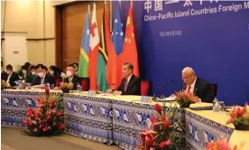  ?? Photograph: Xinhua/REX/Shuttersto­ck ?? China’s foreign minister Wang Yi and Fiji’s prime minister Frank Bainimaram­a co-host a meeting of Pacific foreign ministers in Suva, at which Pacific leaders rejected a sweeping economic and security deal with China.