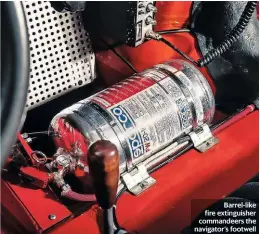  ??  ?? Barrel-like fire extinguish­er commandeer­s the navigator’s footwell