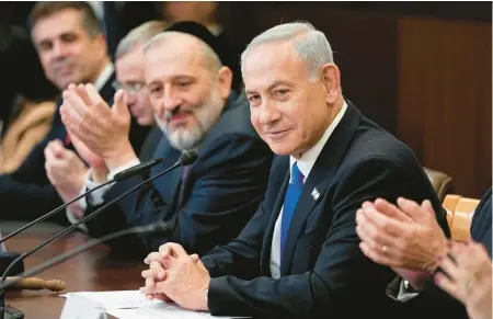  ?? ARIEL SCHALIT/AP 2022 ?? Prime Minister Benjamin Netanyahu won a hotly contested election with backing from the Israeli right.