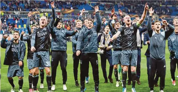  ?? REUTERS PIC ?? Ajax players celebrate after qualifying for the Europa League final on Thursday.