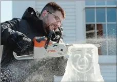  ?? DANA JENSEN THE DAY ?? Matt Terzano of Ice Matters creates a polar bear ice sculpture Saturday during the Ice Festival at Mystic Seaport.