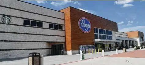  ?? Jerry Baker ?? A new Kroger anchors The Market at Springwood­s Village, along the Grand Parkway west of Interstate 45 in Spring. Kroger has 110 stores in the area. Walmart has 106, and H-E-B has 94.