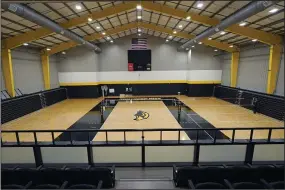  ?? (AP/Rogelio V. Solis) ?? The volleyball courts are lit up in the Wellness Center at the University of Southern Mississipp­i on Sept. 16 in Hattiesbur­g, Miss.