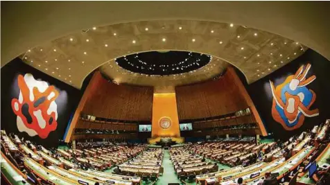  ?? Reuters ?? This fish-eye lens view shows the United Nations General Assembly, in the Manhattan borough of New York, on Wednesday, as world leaders spoke about their regional disputes.