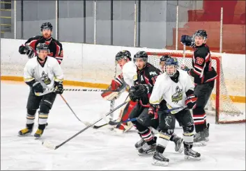  ?? COLIN CHISHOLM ?? The River Rats net was crowded with players during the play-off game against the Eastern Shore Thunder on Feb. 21, 2018.