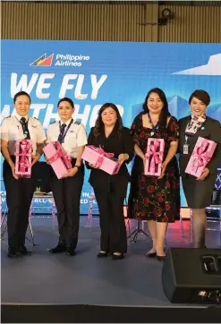  ?? ?? (From left) Captains Lilybeth Tan-Ng and Amorelle Martinez, Equipment Chief Pilot, Airbus Division of PAL Express together with other empowered female PAL executives Jo-Ann Maluenda, VP Human Capital; Michelle Mariano, AVP, Cabin Crew Operations Department of PAL Express; and Maria Dolores Castillo, Cabin Services Manager.