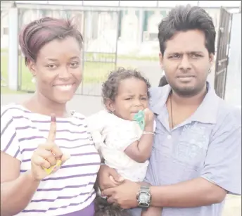  ?? Photo) (Stabroek News’ file ?? This couple defied the odds and came together as a family.