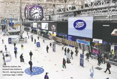  ?? TOBY MELVILLE/REUTERS; COLUMBIA PICTURES ?? Waterloo station, the busiest train station in the U.K., during morning rush hour Sept. 7, 2020