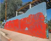  ?? PHOTOS BY GABRIELA CAMPOS/THE NEW MEXICAN ?? ABOVE: Carlos Cervantes sits among his murals Thursday in Louis Montaño Park. ‘These are stories that are part of my culture, my heritage,’ he said.