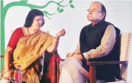  ?? PHOTO: PTI ?? Finance Minister Arun Jaitley with State Bank of India Chairman Arundhati Bhattachar­ya in Mumbai on Tuesday