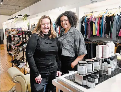  ?? CATHIE CO WARD PHOTOS THE HAMILTON SPECTATOR ?? Lex Brown, right, and her mom, Raquel, left, along with Lex's sister Lateisha own the consignmen­t clothing store Reloved Boutique. They sell a line of eco-friendly produce bags and hair scrunchies that Lex makes under the name Neoteny Apparel.