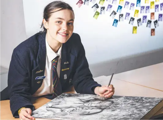  ?? Picture: Kevin Farmer ?? HEARTFELT ART: Year 12 Fairholme College student Sarah McMaster will be showcasing her artwork at the school’s upcoming FACETS: An Art Exhibition At Fairholme.