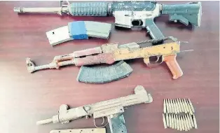  ?? HOPETON BUCKNOR ?? Photos of the three illegal weapons and ammunition seized in St James.