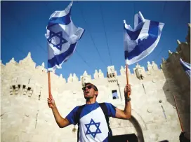  ?? (Reuters) ?? ‘SINCE THE return to Zion, the modern world looks on in amazement at how time after time, the Jewish nation and the State of Israel break through convention­al barriers, with courage and out-of-the-box thinking, and do the impossible.’