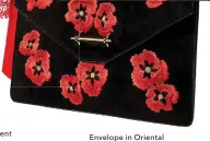  ??  ?? Envelope in Oriental poppies embroidery, $1,280, by M2malletie­r at Saks Fifth Avenue.