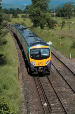  ?? PETER FOSTER. ?? TransPenni­ne Express 185117 heads west along the Hope Valley Line having just passed Bamford on June 25 2016. Readers believe that the line is unsuitable for improved Manchester-Sheffield services.