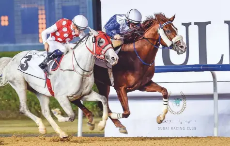  ?? Ahmed Ramzan/Gulf News ?? Es Ajeeb, ridden by Sam Hitchcott, on the way to winning the Group 2 Bani Yas, sponsored by Gulf News, at Meydan Racecourse yesterday, the third race meeting of the 2018-2019 season in Dubai.