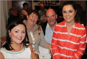  ??  ?? Caroline Daly (left) and her sister Leeann with parents Breda (originally from Knocknagos­hel) and George (originally Cahersivee­n).