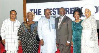  ?? ?? Mr. Soji Alabi ( left); Evang. Adejoke Akande; Presiding Prophet, CAC Ori- Oke Baba Abiye Ede, Osun State/ Special Guest Minister, Prophet Funso Akande; Presiding Pastor, GRCC, Pastor Paul Lawal with his wife, Deaconess Mojibola Lawal; and Gospel artiste, Evang. Tope Alabi during the Glorious Restoratio­n Church of Christ's dedication and Thanksgivi­ng Service, held in Ogun State