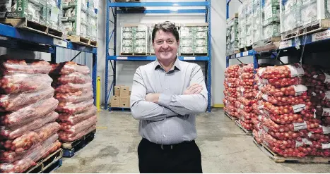  ?? NICK PROCAYLO ?? CEO David Long is overseeing the Greater Vancouver Food Bank’s move from cramped quarters in Strathcona to a large Burnaby facility.