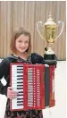  ??  ?? Lucy MacIntyre from Spean Bridge Primary School took first place in the accordion intermedia­te.