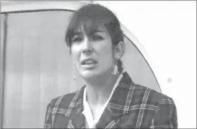  ?? DOMINIQUE MOLLARD - ASSOCIATED PRESS ?? In this Nov. 7, 1991, file photo Ghislaine Maxwell, daughter of late British publisher Robert Maxwell, reads a statement in Spanish in which she expressed her family’s gratitude to the Spanish authoritie­s, aboard the “Lady Ghislaine” in Santa Cruz de Tenerife. Maxwell, a British socialite who was accused by many women of helping procure underage sex partners for Jeffrey Epstein, was arrested Thursday in New Hampshire, the FBI said.