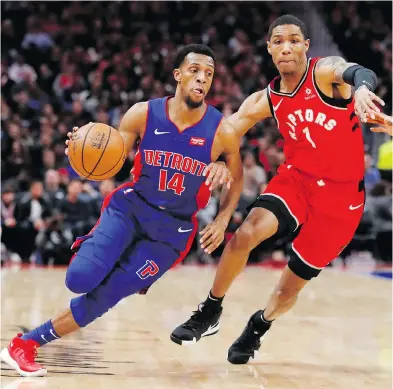  ?? CARLOS OSORIO / THE ASSOCIATED PRESS ?? Pistons guard Ish Smith drives against Raptors counterpar­t Patrick Mccaw during NBA earlier this month in Detroit. Mccaw is hoping for a deep run with Toronto after showing what he can do during Sunday’s game against Miami.