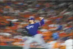  ?? AP photo ?? Rangers starting pitcher Jordan Montgomery throws during the seventh inning of Game 1 of the AL Championsh­ip Series against the Astros on Sunday.