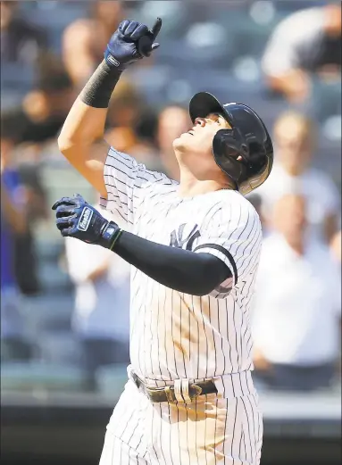  ?? Mike Stobe / Getty Images ?? Gio Urshela of the Yankees celebrates after hitting a home run to left field in the fifth inning against the Orioles Monday at Yankee Stadium in New York.