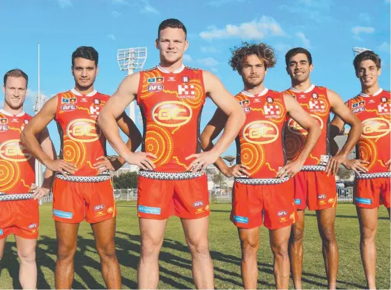  ?? Picture: GOLD COAST SUNS ?? Gold Coast Suns players (from left) Brandon Matera, Callum Ah Chee, Steven May, Jarrod Harbrow, Jack Martin and Sean Lemmens in the special guernseys they will wear as part of the Sir Doug Nicholls Indigenous Round.