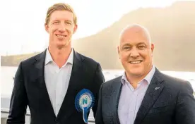  ?? Photo / Mead Norton ?? Sam Uffindell with National Party leader Christophe­r Luxon campaignin­g in Mount Maunganui in June.