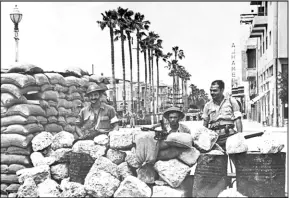  ?? ?? Nation’s defenders: Israeli troops man a barricade during the 1948 war