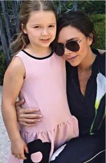  ?? ?? Mummy’s girl: The Instagram snap of Harper Beckham wearing one of Victoria’s designs