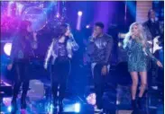  ?? ABC/ ERIC MCCANDLESS ?? Madison VanDenburg, second from left, performs on the season finale of American Idol along with Alyssa Raghu, Kool & the Gang, and Laci Kaye Booth.
