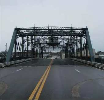  ?? MASS.GOV PHOTO ?? SWING SHIFTS: An operator at the New Bedford-Fairhaven Swing Bridge was paid more than $100,000 in overtime last year — an average of more than 45 extra hours a week.