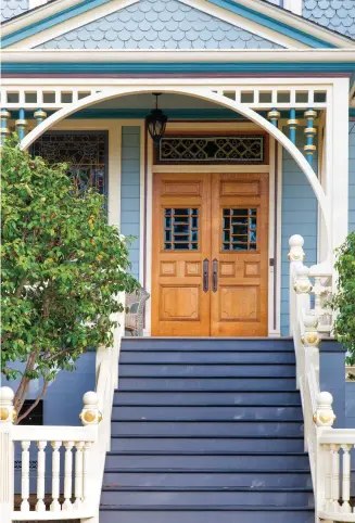  ??  ?? ABOVE Elements structural and decorative on porches like this one on a Queen Anne Victorian survive because they typically were built with tight-grained, old-growth lumber, and regularly maintained with paint.