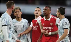  ?? Photograph: Adrian Dennis/AFP/Getty Images ?? Arsenal's Gabriel Magalhães makes his feelings known as players clash during Liverpool’s defeat at the Emirates.