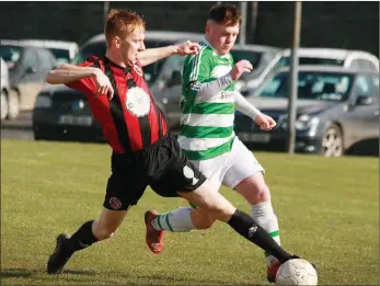  ??  ?? Paul Brennan of Gorey Rangers tackling Castlebar Celtic’s Jason Hunt in the last round of the FAI Junior Cup in early March. The quarter-final, away to Usher Celtic from Dublin, is fixed for Sunday, July 26.