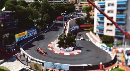  ?? AFP PIC ?? Ferrari’s Kimi Raikkonen driving during the second practice session at the Monaco street circuit in Monaco on Thursday.