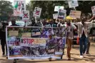  ?? Katumba/AFP/Getty Images ?? Environmen­tal activists protest in front of the Ugandan parliament against the east Africa crude oil pipeline (Eacop), in Kampala on 15 September. Photograph: Badru