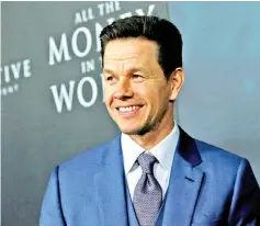  ?? — Reuters file photo ?? Cast member Wahlberg poses at the premiere for ‘All the Money in the World’ in Beverly Hills, California, recently.