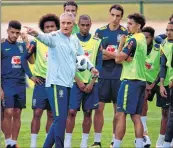  ??  ?? Brazil's coach Tite talks to his players during a training session at Granja Comary training centre in Teresopoli­s, Rio de Janeiro.