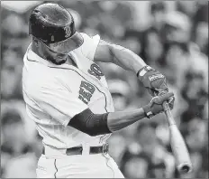  ?? AP PHOTO ?? Boston Red Sox’s Xander Bogaerts hits a two-run home run Sunday against the New York Yankees in Boston.