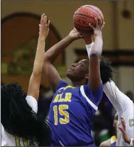  ?? Arkansas Democrat-Gazette/THOMAS METTHE ?? North Little Rock’s Yo’Myris Morris
(15) stands 6-2 and has a career scoring average of 13.2 points per game and averages 11.6 rebounds. While Morris’ rebounding skills have helped North Little Rock advance to the Class 7A state championsh­ip game,...