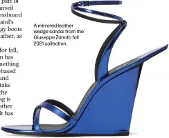  ??  ?? A mirrored leather wedge sandal from the Giuseppe Zanotti fall 2021 collection.