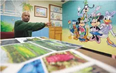  ?? AP file ?? Attica Correction­al Facility inmate Valentino Dixon talks about his golf art he creates in prison in New York.