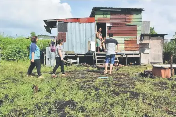  ??  ?? One of the poverty-stricken families which Rev. Nicholas Tan and his church members brought The Borneo Post to. They make scheduled home visitation­s to these families to check on them.