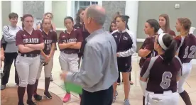  ?? DANIEL CONNOLLY ?? Parent Jay Eubank talks with female athletes and other adults after the group raised complaints about equity between girls’ and boys’ sports at Colliervil­le High School.