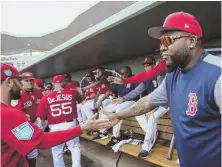  ?? GETTY IMAGES ?? GUEST STAR: David Ortiz makes an appearance in the Red Sox dugout yesterday.